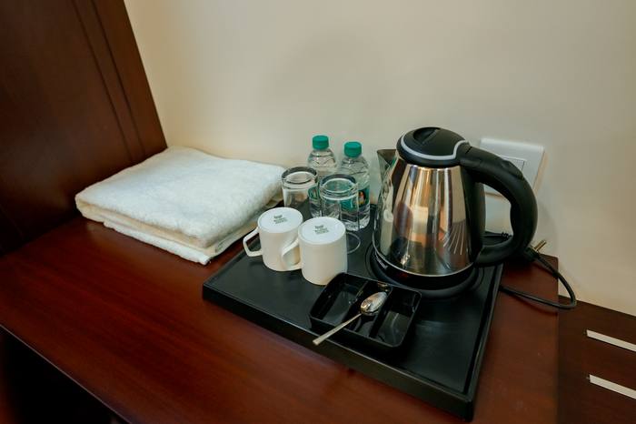 In-room amenities tray at Legacy Square Hotel