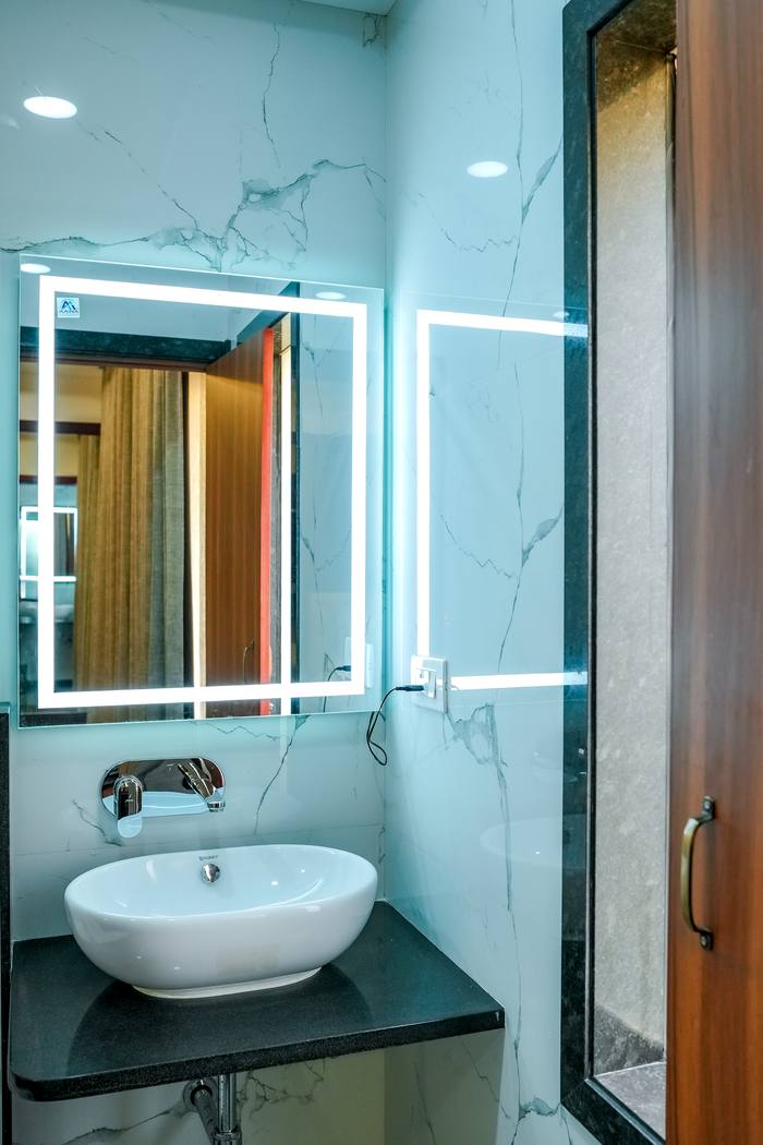 Guest bathroom at Legacy Square Hotel