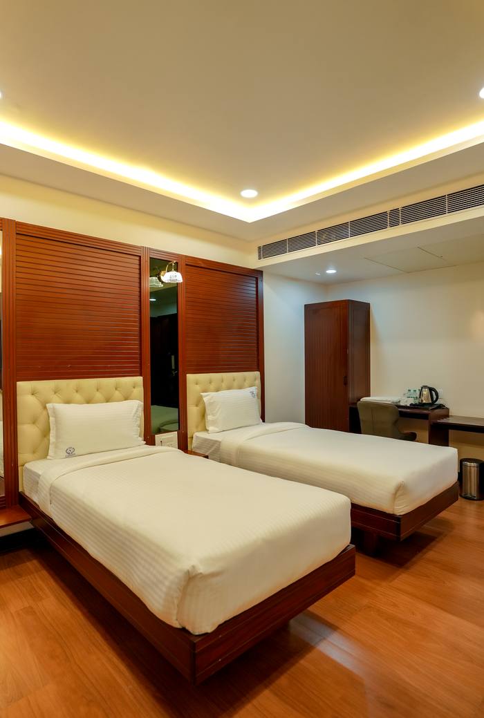 Queen Deluxe twin-bed room, second angle, Legacy Square Hotel